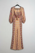 Sandro Jumpsuit S Peach with pink, purple, white, and yellow floral and geometric patterns